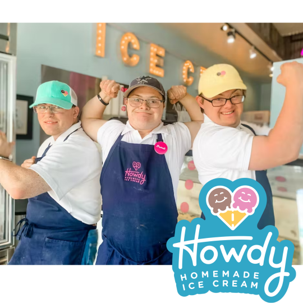 Howdy Homemade Ice Cream. Three individuals with disabilities flex their biceps. 
